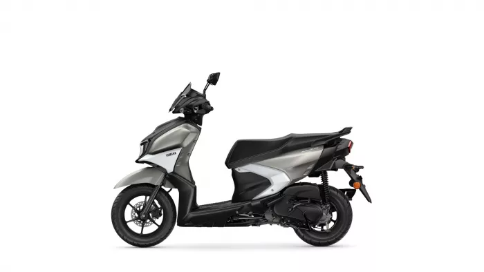 Side view of a Yamaha motor scooter in black and gray on a white background