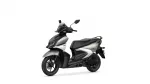 Front-right view of a black and silver Yamaha scooter with a windscreen and headlight.