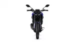 Front view of a blue sport motorcycle on a white background with black handlebars and mirrors visible from the rider’s position.
