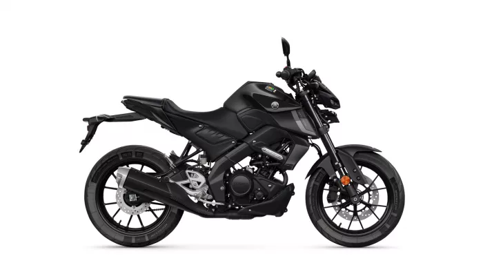 Side view of a matte black Yamaha sport motorcycle photographed against a white background, showing the left profile and exposed engine parts.
