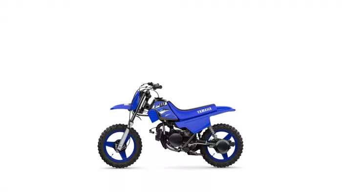 Side view of a blue Yamaha dirt bike toy with knobby tires on a white background
