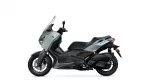 Side view of a gray and black Yamaha X-MAX scooter with windshield and exposed front disc brake, facing left