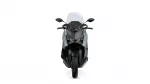 Front view of a gray and black sport motorcycle with a clear windshield and dual headlights in a symmetric stance, head-on view.