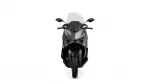 Front view of a black sport motorcycle with a windshield, headlights, and wide handlebars on a white background.