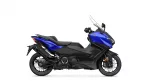 Side view of a blue Yamaha sport motorcycle with black frame and clear windshield on a white background, logo visible on the fairing.