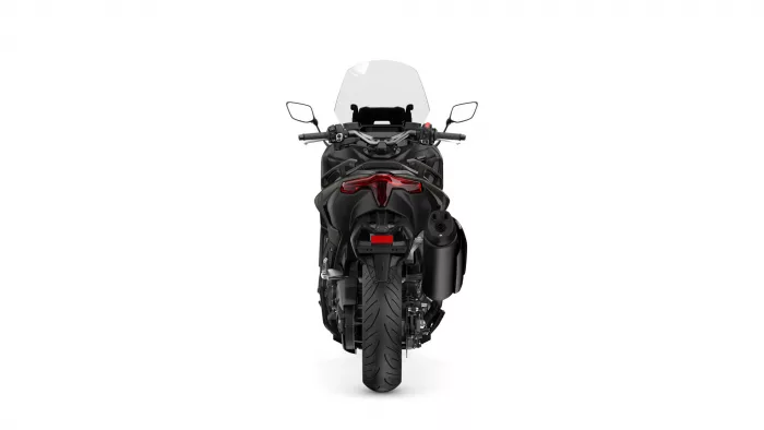 Rear view of a black sport motorcycle with a clear windscreen and red taillight on a white background.