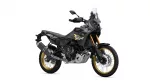 Black Yamaha World Raid adventure motorcycle with gold rims and tall windshield, shown in side view