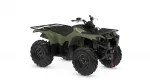 Green Yamaha Kodiak ATV with large knobby tires and front/rear cargo racks【0】.