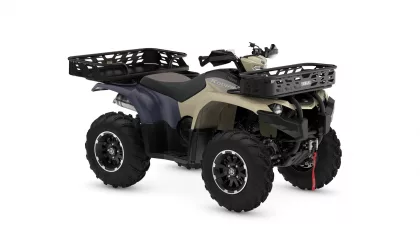 All-terrain vehicle (ATV) with front and rear cargo racks, beige and blue body, large off-road tires, shown from a side angle to highlight storage options.