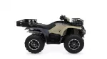Yamaha Kodiak ATV with beige body, black seat, and front and rear cargo racks.