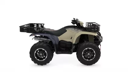 Yamaha Kodiak ATV with beige body, black seat, and front and rear cargo racks.