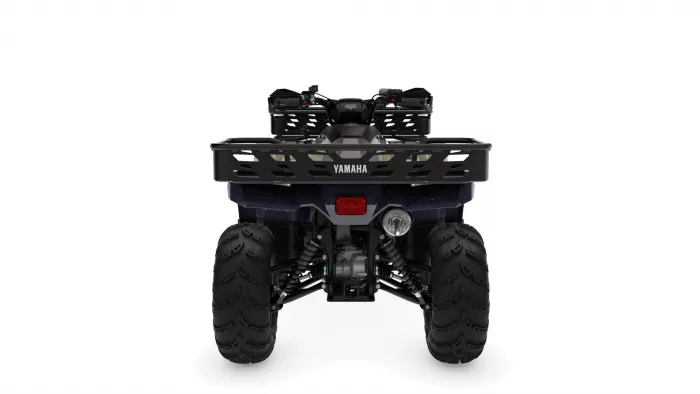 Rear view of a black Yamaha ATV with a heavy-duty cargo rack and large off-road tires