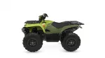 Green all-terrain vehicle (ATV) with front and rear racks and large knobby tires, showing Yamaha branding on the side.