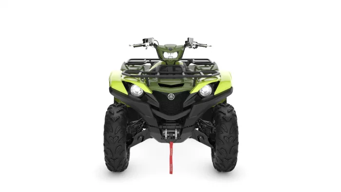 Front-on view of a lime-green ATV with large off-road tires and protective bumper.