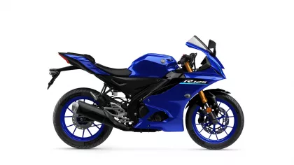 Blue Yamaha R125 sport motorcycle seen from the left side, showing its fairing, fuel tank, and front wheel with disc brake (side profile).