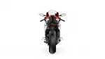 Rear view of a red-and-white sport motorcycle on a white background.