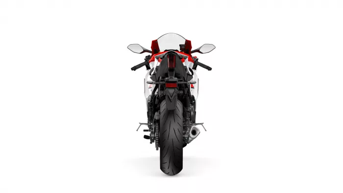Rear view of a red-and-white sport motorcycle on a white background.