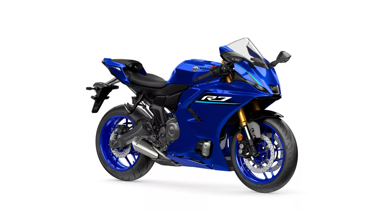Blue Yamaha R7 sport motorcycle, front-right angle with gold inverted forks and racing decals.