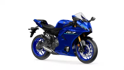 Blue Yamaha R7 sport motorcycle, front-right angle with gold inverted forks and racing decals.