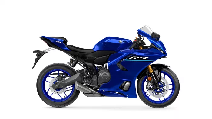 Blue Yamaha R1 sport motorcycle shown in a side profile with aero fairing and blue wheels.",