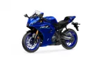 Blue Yamaha sport motorcycle shown from a left-front angle, featuring a blue fairing, windscreen, and gold front forks with prominent R7 branding.
