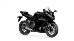 Black Yamaha sport motorcycle shown from a front-right angle with visible R1 logo on the fairing and large front brake discs.