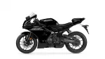 Side view of a black Yamaha R1 sport motorcycle with a silver windshield and exposed engine components against a white background