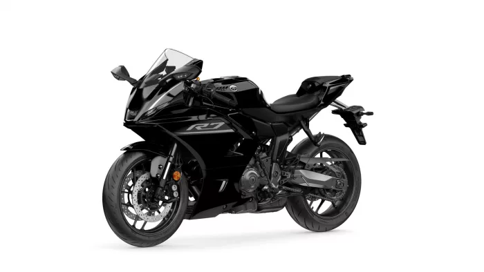 Black Yamaha sport motorcycle shown from front-left with a clear windscreen and visible front discs and fairings.