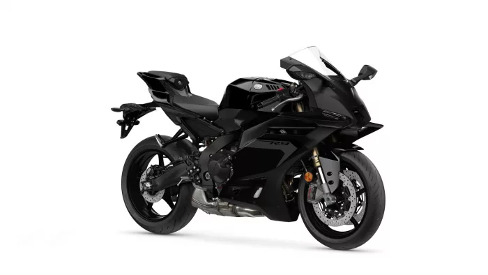 Black Yamaha sport motorcycle in a three-quarter view with a clear windscreen and aggressive aerodynamic fairings.