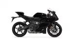 Side view of a black sport motorcycle with a Yamaha logo on the fuel tank, showing its sleek fairings and exposed engine against a white background.