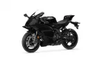 Black Yamaha sport motorcycle shown from a front-left three-quarter view with angular fairings and windscreen.