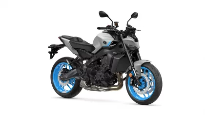 Yamaha sport motorcycle with gray body and bright blue rims, shown from a left-front angle.