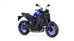 Blue sport motorcycle photographed from a front-right angle, showing blue bodywork, black frame, and alloy wheels with disc brakes