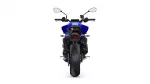 Rear view of a blue sport motorcycle with mirrors, taillight, and wide rear tire against a white background, showing the bike’s silhouette.