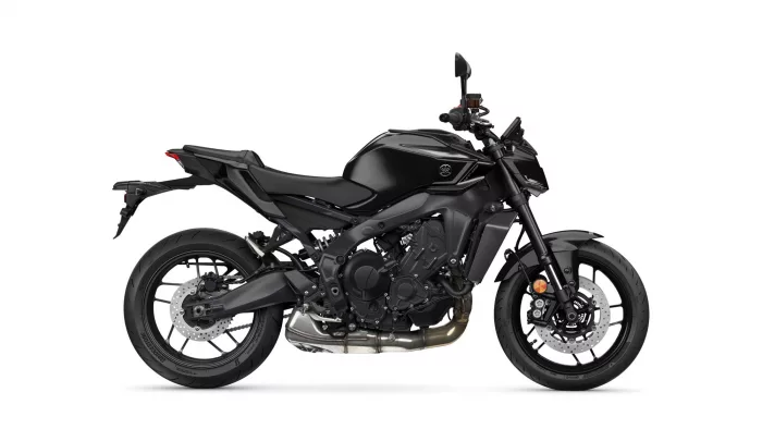 Black Yamaha sport motorcycle shown in a left-side profile, displaying the engine, exhaust, wheels, and disc brakes.