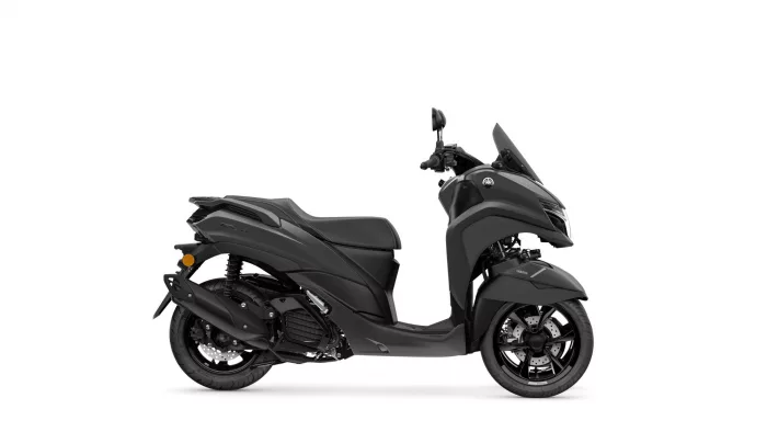 Split view of a black Yamaha scooter on a white background: rear section on the left and the front with handlebars on the right.