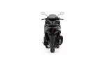 Rear view of a black motorcycle, showing the tail section, rear wheel, and two mirrors against a white background.