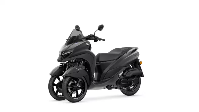 Gray Yamaha three-wheeled scooter on a white background, shown from the front-right.