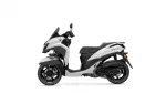Side view of a white and gray Yamaha Tricity scooter against a white background, showing the front fairing and seat.