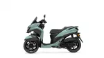 Teal Yamaha Tricity scooter shown from a left-front angle, highlighting the front panel and seat area.