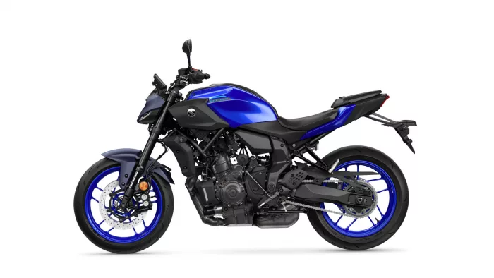 Blue Yamaha MT-07 motorcycle with black frame and blue rims, side view showing engine and single-seat design