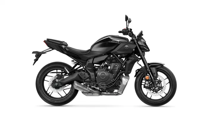 Left-side profile of a black Yamaha MT-07 sport motorcycle on a white background, showing its fuel tank and engine.