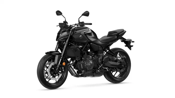 Black Yamaha MT sport motorcycle shown from a left-front angle with aggressive styling and front disc brakes visible on the wheel.