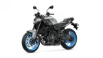 Gray Yamaha MT-07 sport motorcycle shown from a left-front angle with blue rims and visible drivetrain components
