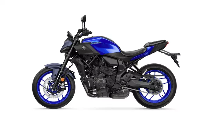 Side view of a blue Yamaha MT-07 sport motorcycle with black frame and blue rims, shown against a white background.