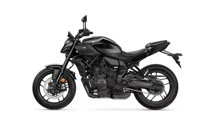 Black Yamaha MT-07 motorcycle shown in profile from the left side against a white background, highlighting its matte black finish and exposed engine.