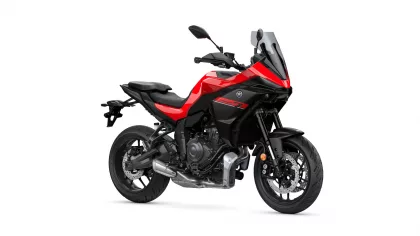 Red and black Yamaha sport-touring motorcycle, angled front-right view showing windscreen and fairing