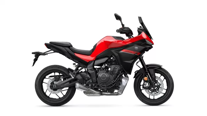 Yamaha Tracer 7 sport-touring motorcycle in red and black, shown from the left side.