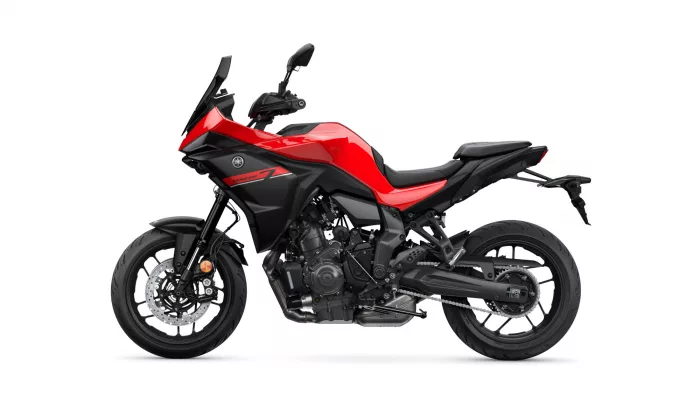 Red and black Yamaha Tracer sport motorcycle shown in a left-side profile on a white background.