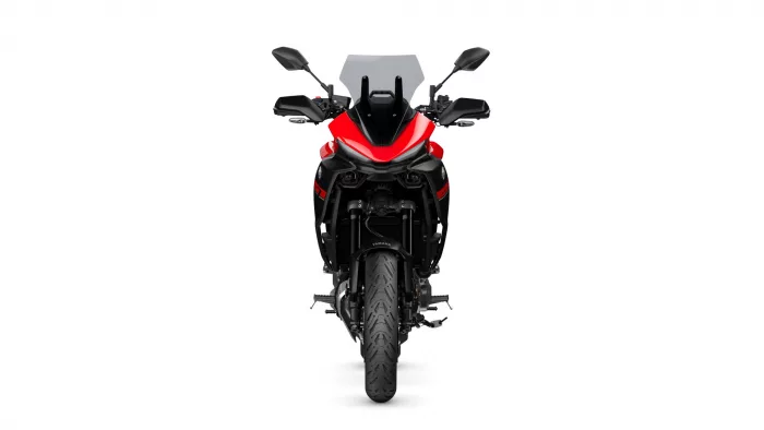 Front view of a red Yamaha sport motorcycle with black trim and windshield, centered on white background.